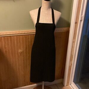 Three black bib aprons